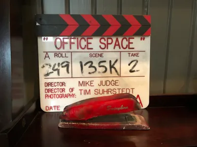 Office Space film slate with the iconic red Swingline stapler